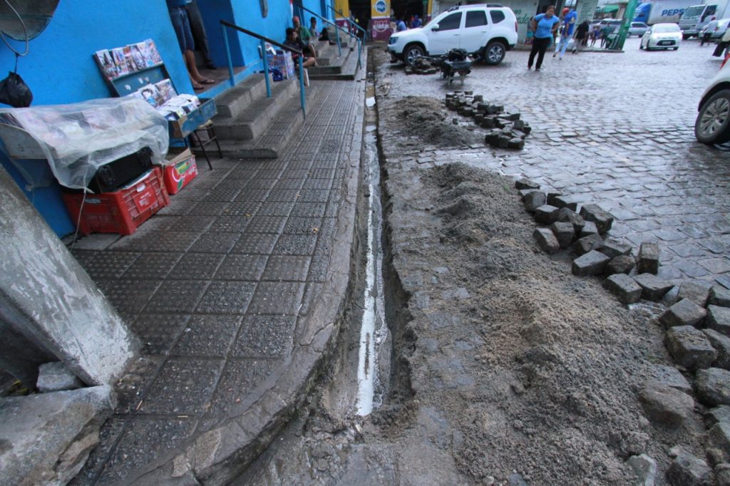 - A car parked on a sidewalk - Geology